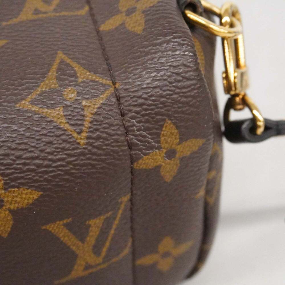 LOUIS VUITTON Brown Monogram Backpack - Picture 11 of 16